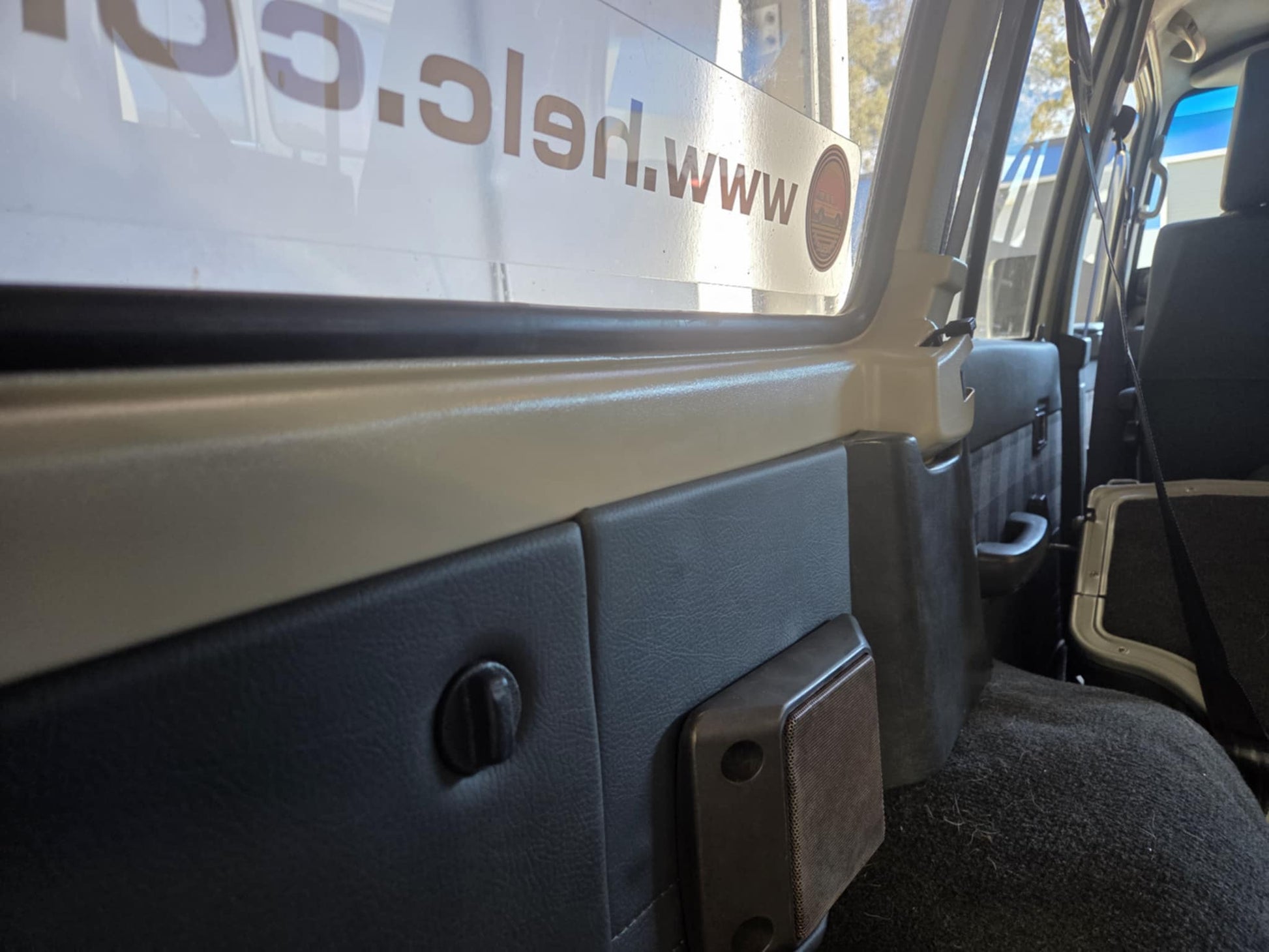 Rear cargo window lower trim piece 60 Series Landcruiser image 6
